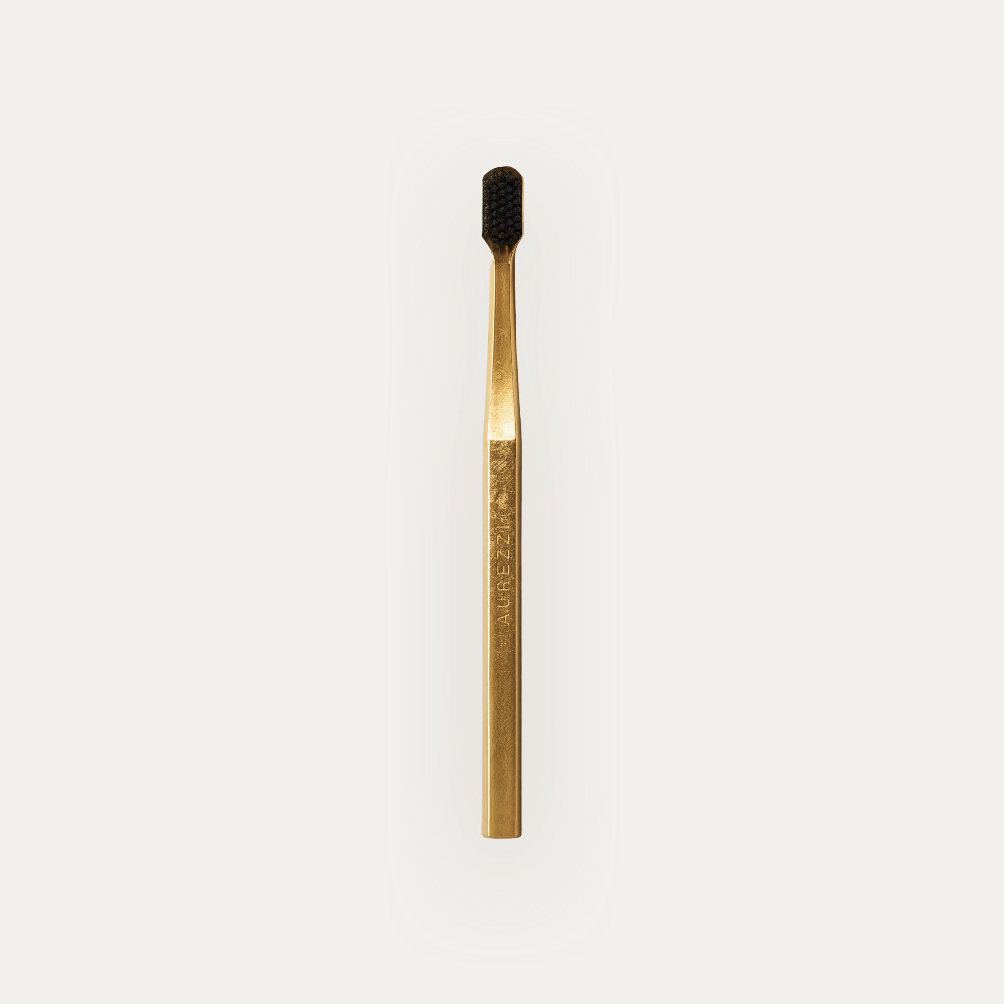 Aurezzi_Toothbrush_24K_Gold_-_Black_Medium_5c2c15d4-9ec8-4150-adc3-19129d33723e.jpg